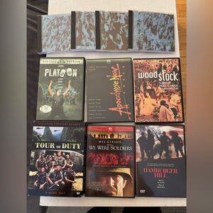Various Vietnam war DVDs and Woodstock 25th anniversary collection CDs